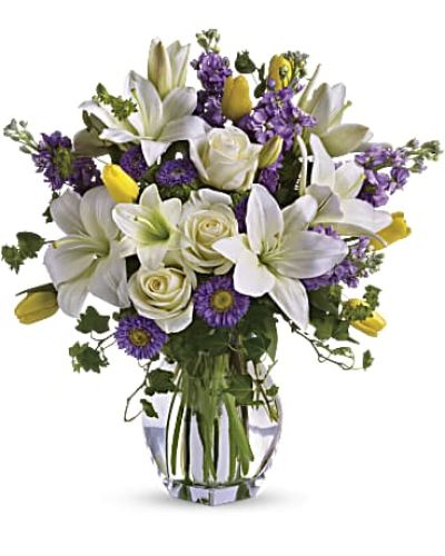 <div id="mark-3" class="m-pdp-tabs-marketing-description">Dance into spring! Send this bouquet of favorite spring flowers to brighten someone's day with the playful beauty of nature. Such a pretty way to say, "I'm thinking of you!"</div>
<p> </p>
<div id="desc-3">
<ul>
<li>This white, lavender and yellow bouquet includes white asiatic lilies, cream roses, yellow tulips, lavender stock, lavender matsumoto asters and greens including bupleurum, ivy and seeded eucalyptus.</li>
</ul>
</div>